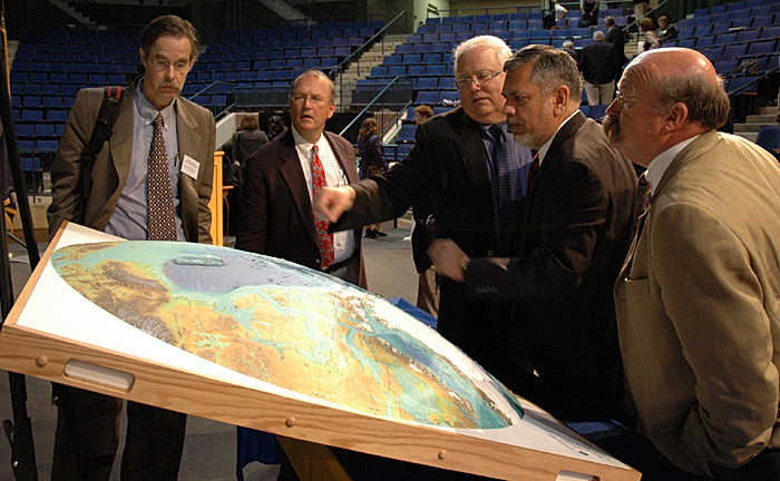 photo of Arctic relief map and Symposium attendees, June 9, 2009.