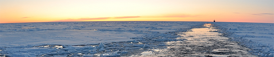 photo: Ice and ship at sunset