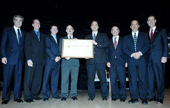 photo of Paul Chang (fifth from left) receiving DOC Gold Medal